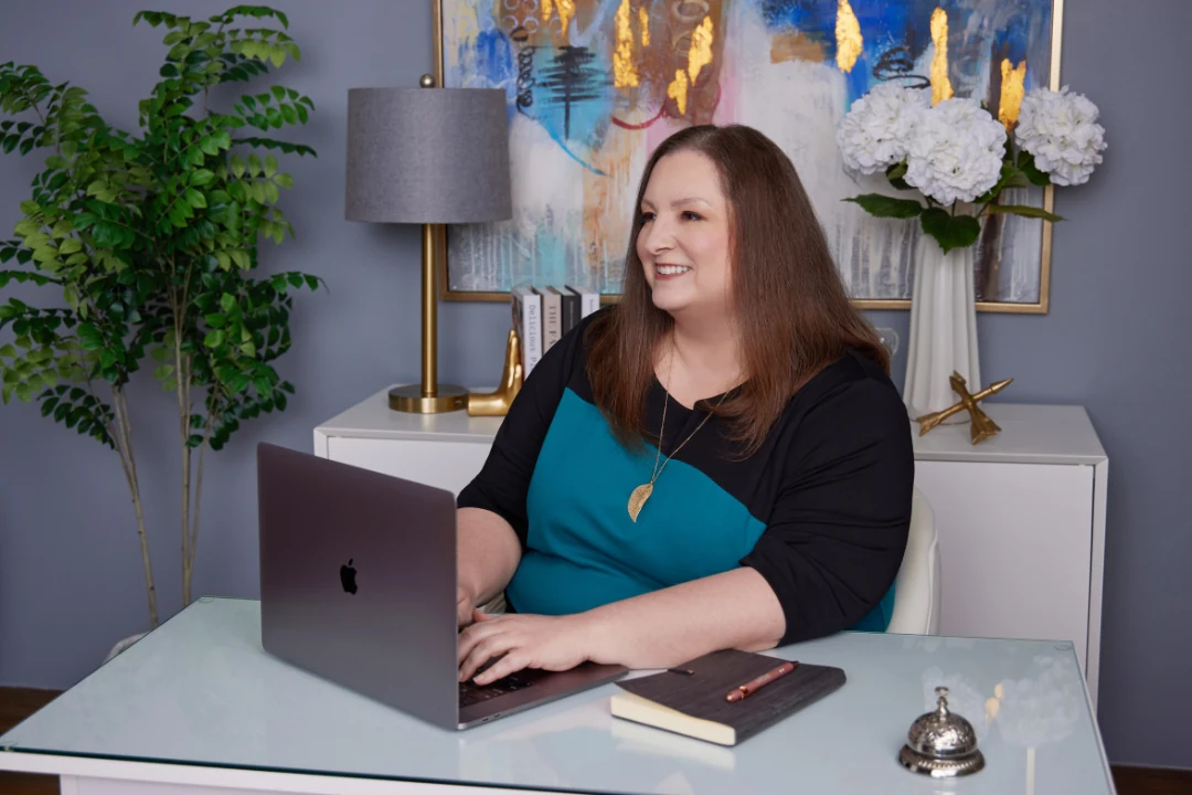 Cassie Lincoln working at her desk